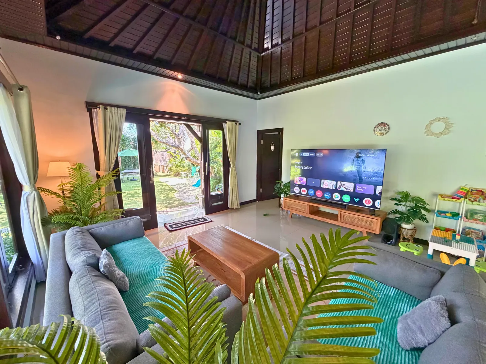 Living room and garden at Family Villa Sanur