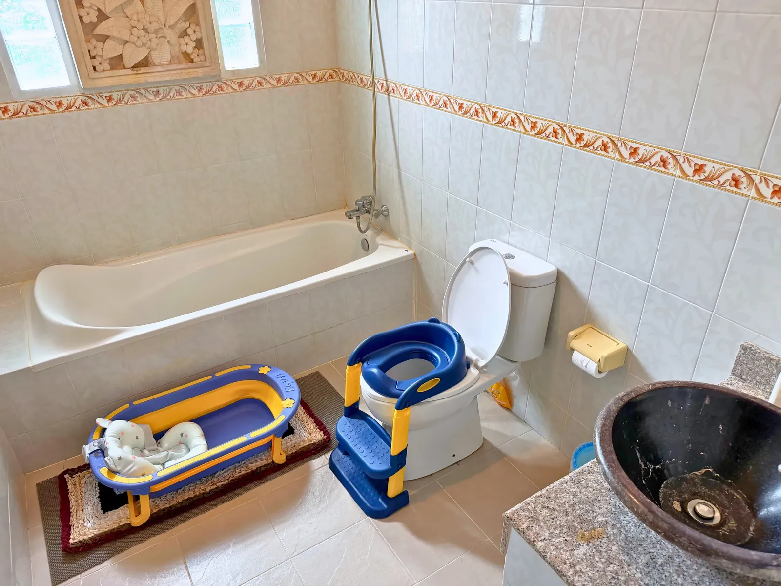 Baby bath and child toilet-training seat at Family Villa Sanur